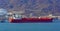 Oil/chemical tanker in front of shore terminal.