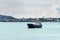 Oil or Chemical Tankers anchor in the harbour near the seaside town in Thailand