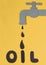 Oil concept. Black drop dripping from tap to black letters. Oil concept.