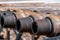 Oil Drill pipe. Rusty drill pipes were drilled in the well section. Downhole drilling rig.