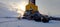 Oil drilling rig. Winter at dawn in the snow