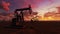 Oil field at sunset