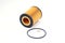 The oil filter lies with a sealing ring on a white background.