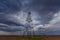 Oil and gas rig profiled on ominous stormy sky