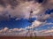 Oil and gas rig profiled on ominous stormy sky