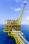 Oil and gas tender platform during drilling.