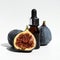 Oil in a glass bottle with a pipette. A bottle of fig oil with fresh fruit on a white background. Organic natural bio-oil.