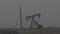 Oil industry, Pumping petroleum Rig in desert. Pump Jack Extracting Crude Oil from a Oil Well. Fossil Fuel Energy