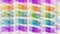 Oil paint glossy squire pattern abstract texture background.Purple,green,golden yellow colored mixed horizontally align pattern