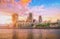 Oil paint image of Skyscrapers of the City of London over the Thames river at sunset