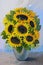 Oil painting - bouquet of sunflowers in a vase on an abstract background