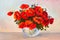 Oil painting still life, a bouquet of poppies in a vase, colorful.