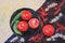 Oil painting unusual still life with red tomatoes and green pepper on a black background close-up, top view, expressive texture, b