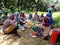 oil palm plantation workers take a break for lunch