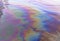 Oil petrol water pollution. Ecological disaster. Slick industry oil fuel spilling water pollution. Water with patches of gasoline