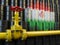 Oil pipe line valve in front of the Iranian flag on the oil barr