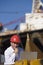 An oil platform inspector with his laptop