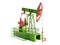 Oil pumping jack model on white background