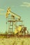 Oil pumpjack, industrial equipment. Extraction of oil. Petroleum concept.