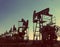 Oil pumps silhouette - vintage retro style