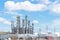 Oil refinery column un er cloud blue sky in Pasadena, Texas, USA