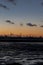 Oil Refinery at Dusk Portrait with Tide out Industry Pollution Energy Power Plant Environment