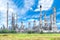 Oil refinery plant against blue sky