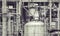 Oil refinery plant detail in vintage tone edit