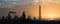 Oil refinery silhouette at sunrise