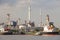 Oil refinery and tanker ship on port in heavy industry use for e