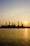 Oil refinery view and freighter with Sunrise
