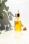 Oil serum with vitamin E in glass bottle. Skin care beauty product. Anti age face moisturizer. Concept natural and organic