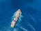 Oil ship chemical tanker sails blue sea. Aerial top view. Concept export