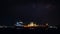 Oil ship tanker loading oil at the oil brige on the sea from refinery for transportation. at night over lighting in Thailand