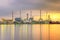 Oil tank ship mooring in oil refinery industry at twilight time