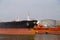 Oil tanker moored near an oil silo in Port of Antwerp