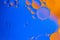 Oil in water abstract micro bubbles gradient blue-orange space background