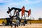 Oil well pumpjack in rural landscape