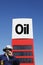 Oil-worker and fuel sign