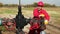 Oil Worker Repairing A Oil Pumping Unit At A Oil Well