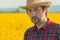 Oilseed rape farmer posing in field