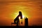 Oilwell Pump Silhouette with a colorful Sunset and tree`s in Kansas.