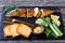 Oily fish: smoked mackerel on a wooden background