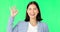 Ok hands, face and happy woman on green screen, background and review of business support. Portrait of female employee