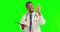 Ok sign, man doctor with perfect hand gesture on a green screen for healthcare success and good service. Happy results