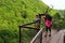 Okatse, Georgia - June 15, 2016: Tourists on pedestrian passageway at Okatse Canyon Natural Monument, an Okatse river erosion