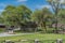 Okaukuejo resort with thatched roof houses and campsite in Etosha National Park