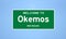 Okemos, Michigan city limit sign. Town sign from the USA.