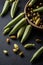 Okra seeds on a black background.