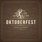 Oktoberfest Greeting card or Flyer on textured background. Beer festival celebration.